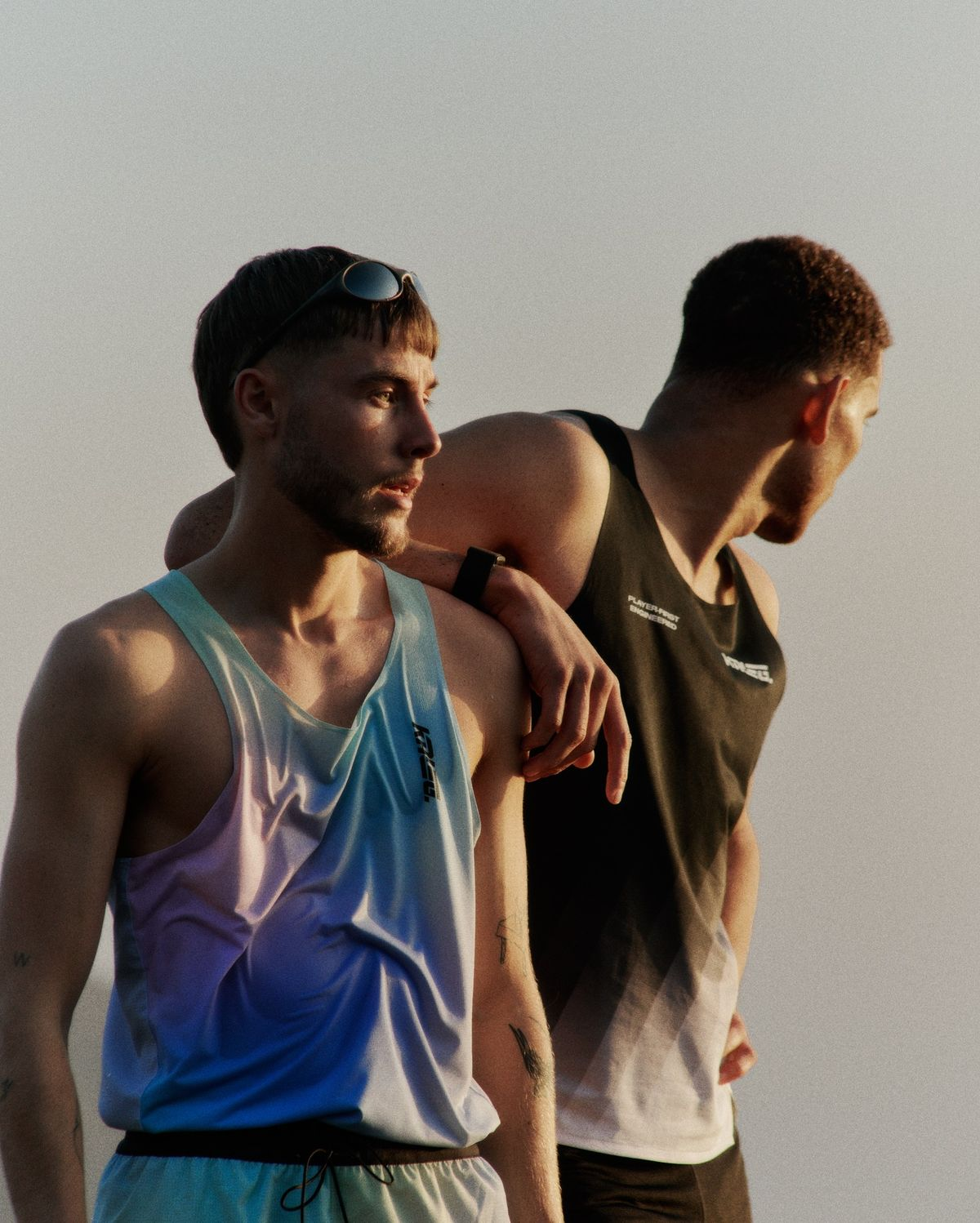 Two men standing outdoors